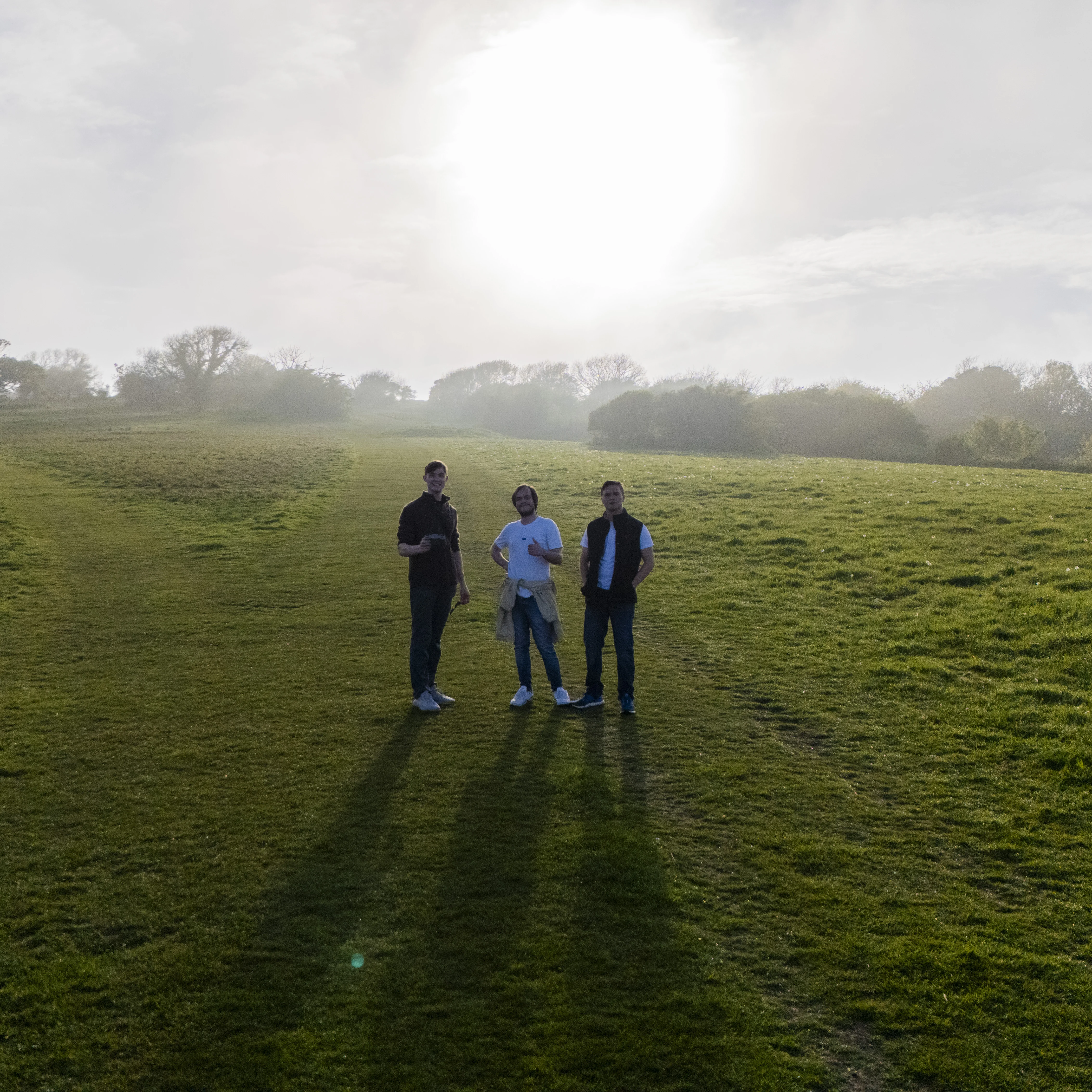 Ryan, Korben and James - standing on the downs - aerial shot from a DJI drone